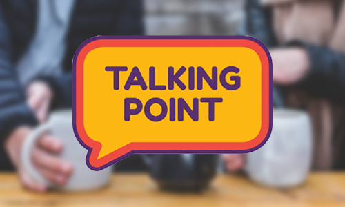 a blurred image of two people sharing tea with the Talking Point logo overlayed which is a speech bubble with Talking Point written inside