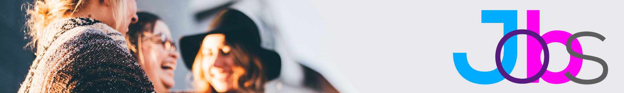 Three women laughing together